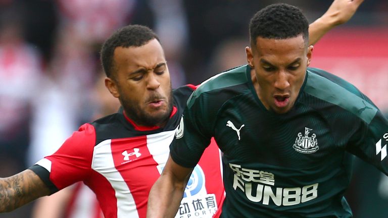 Isaac Hayden of Newcastle United battles for possession with Ryan Bertrand of Southampton 