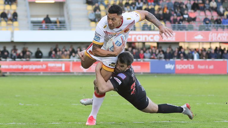 Picture by Laurent Selles/Catalan Dragons/via SWpix.com - 07/03/2020 - Rugby League - Super League - Catalans Dragons v Salford Red Devils - Stade Gilbert Brutus, Perpignan - France - Catalans Israel Folau is tackled by Salford's Elliot Kear.