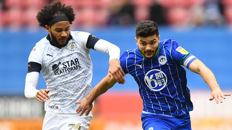 Izzy Brown of Luton Town and Sam Morsy of Wigan Athletic