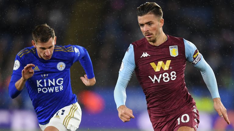 Jack Grealish of Aston Villa gets past the tackle from Marc Albrighton of Leicester City
