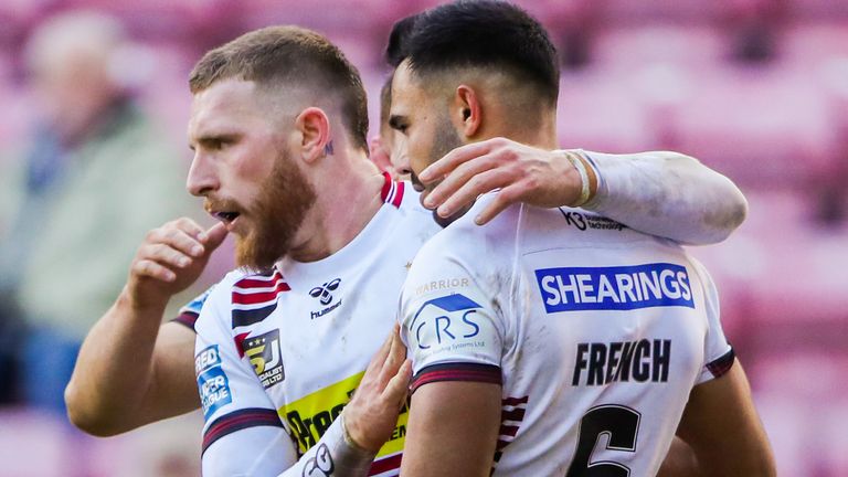 Picture by Alex Whitehead/SWpix.com - 08/03/2020 - Rugby League - Betfred Super League - Wigan Warriors v Hull KR - DW Stadium, Wigan, England - Wigan's Jackson Hastings celebrates his try with Bevan French.