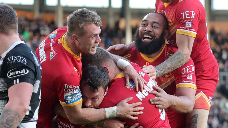 Catalans Dragons' James Maloney celebrates scoring the winning try 