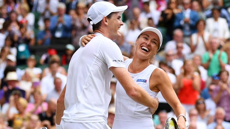 Jamie Murray of Great Britain and partner Martina Hingis of Switzerland celebrate championship point and victory during the Mixed Doubles final match against Heather Watson of Great Britain and Henri Kontinen of Finland on day thirteen of the Wimbledon Lawn Tennis Championships at the All England Lawn Tennis and Croquet Club at Wimbledon on July 16, 2017 in London, England.
