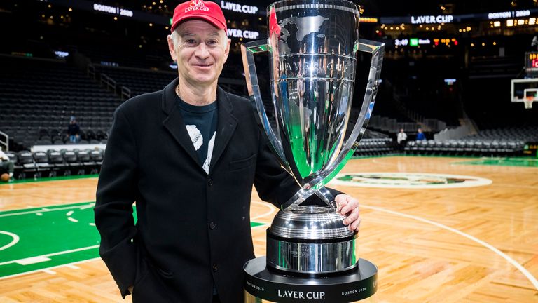 Former tennis player John McEnroe poses for photo with the Laver Cup trophy courtside at TD Garden in promotion of Laver Cup Boston 2020 on March 3, 2020 in Boston, Massachusetts.