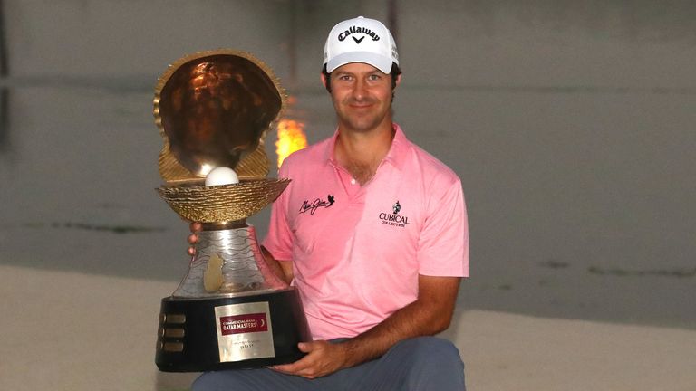 Jorge Campillo proudly displays the Qatar Masters trophy