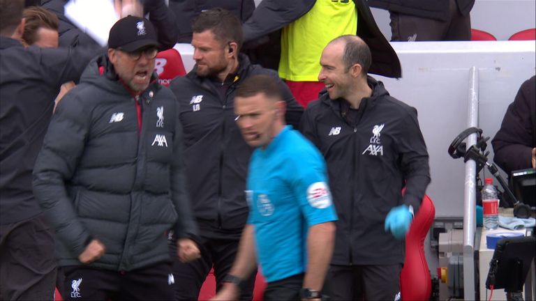 Jurgen Klopp celebrates in front of linesman against Bournemouth