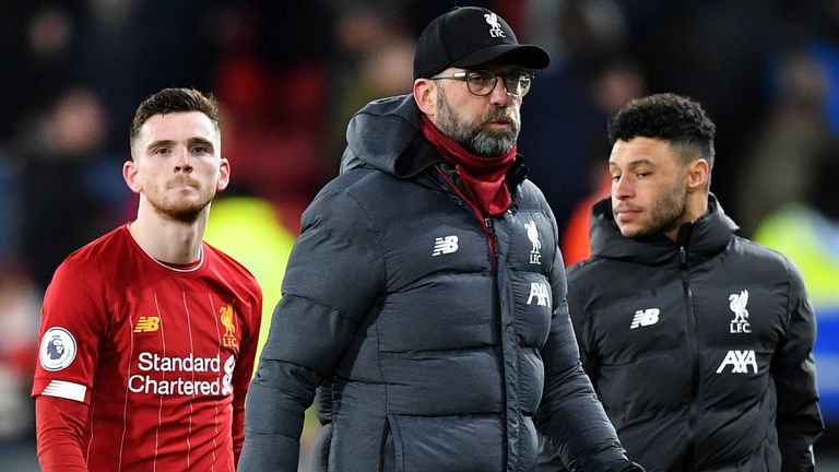 Jurgen Klopp with Andrew Robertson and Alex Oxlade-Chamberlain following Liverpool's 3-0 defeat to Watford