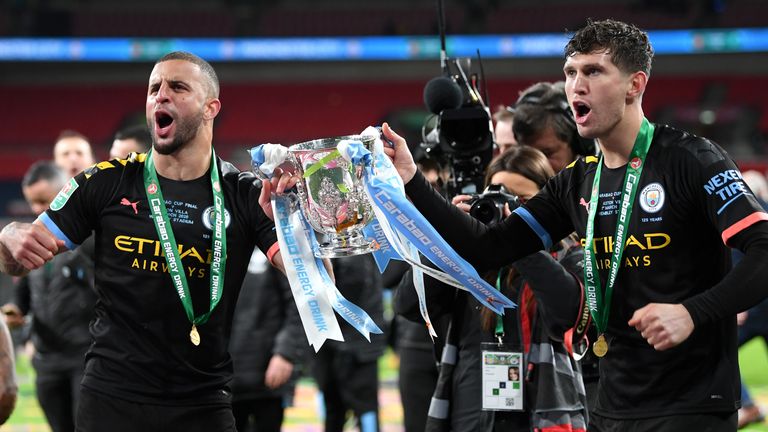 Kyle Walker and John Stones with the Carabao Cup