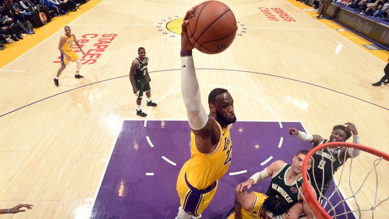 LeBron James of the Los Angeles Lakers dunks the ball during the game against the Milwaukee Bucks
