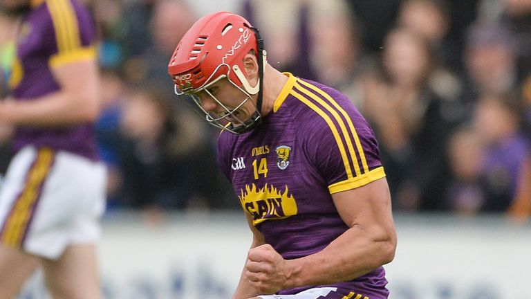 Lee Chin celebrates the famous victory