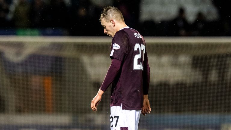 Hearts' Lewis Moore shows his dejection at full-time as relegation fears mounted