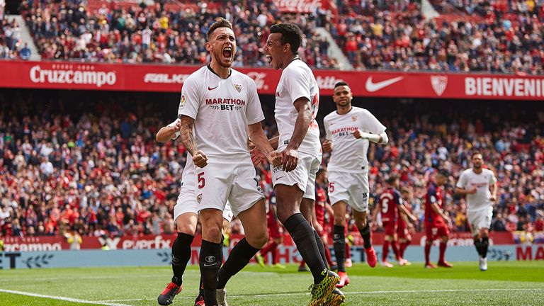 Sevilla dented Atletico Madrid's top-four hopes through Lucas Ocampos' equaliser