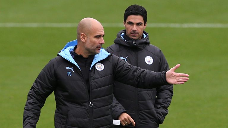 Manchester City boss Pep Guardiola and Mikel Arteta 