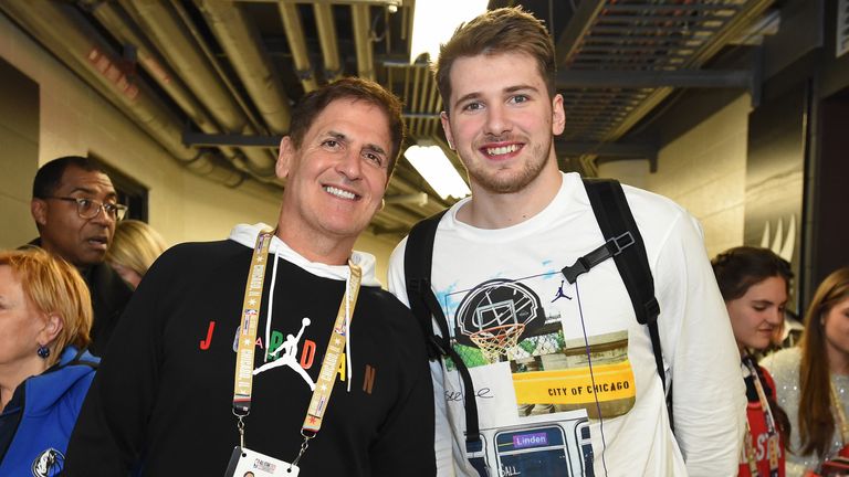 Dallas Mavericks owner Mark Cuban pictured with team star Luka Doncic