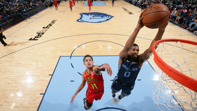 De'Anthony Melton of the Memphis Grizzlies dunks the ball against the Atlanta Hawks