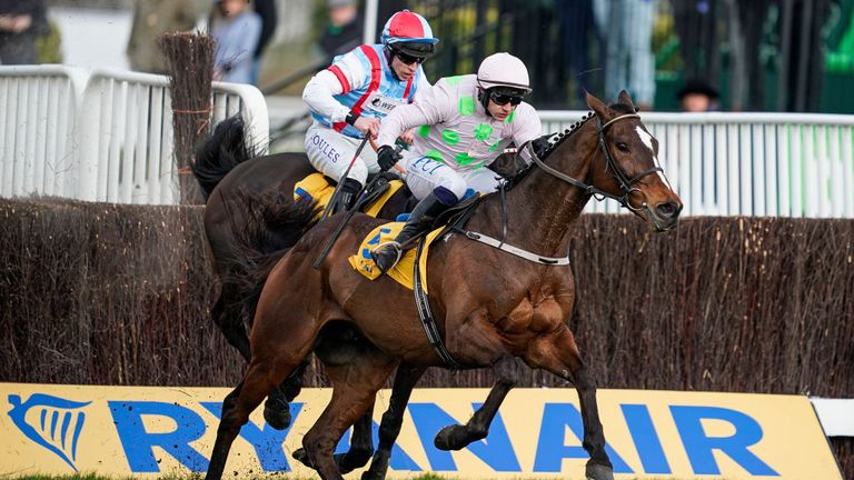 Min leads Saint Calvados over the last fence in the Ryanair