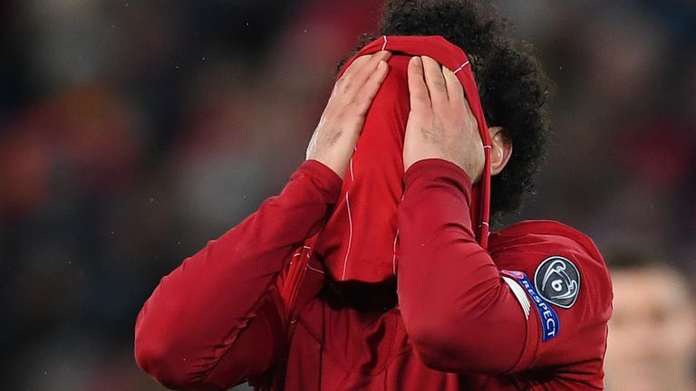Mohamed Salah reacts to a missed chance against Atletico Madrid