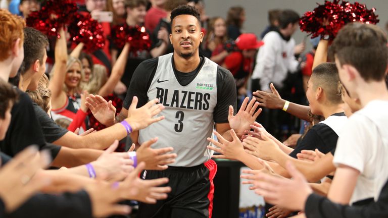 The NBA has cautioned its players to reduce contact with fans and strangers. 