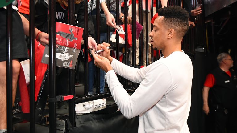 CJ McCollum of the Portland Trail Blazers has tweeted or retweeted several virus-related posts in the last couple days, and said he would stop signing autographs for the moment. 