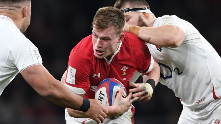 LONDON, ENGLAND - MARCH 07: Nick Tompkins of Wales is tackled by Charlie Ewels of England by during the 2020 Guinness Six Nations match between England and Wales at Twickenham Stadium on March 07, 2020 in London, England. (Photo by Shaun Botterill/Getty Images)
