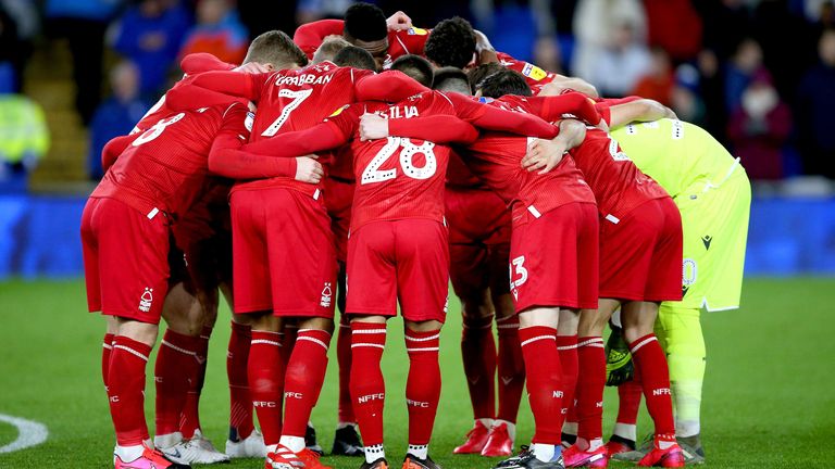 Nottingham Forest players in a team huddle prior to the beginning of the Sky Bet Championship match at Cardiff City Stadium