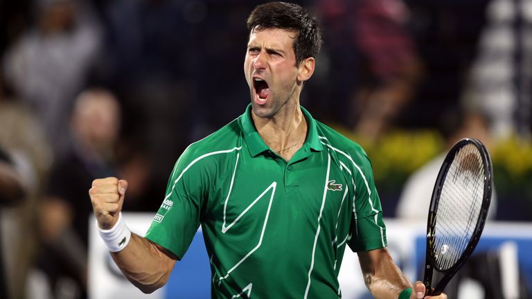 Novak Djokovic of Serbia celebrates after winning the final against Stefanos Tsitsipas of Greece Match Day thirteen of the Dubai Duty Free Tennis at Dubai Duty Free Tennis Stadium on February 29, 2020 in Dubai, United Arab Emirates.