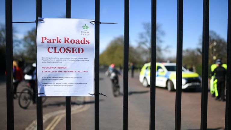 LONDON, ENGLAND - MARCH 22: A sign notifying of a closed road at Greenwich Park, as well as information to stay two metres apart and no group gatherings, on March 22, 2020 in London, United Kingdom. British Prime Minister Boris Johnson urged that people don't visit their parents this Mothering Sunday to curb the spread of COVID-19, which has killed 233 people in the UK. (Photo by Peter Summers/Getty Images)