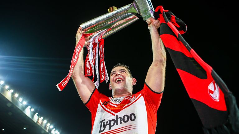 Picture by Alex Whitehead/SWpix.com - 11/10/2014 - Rugby League - First Utility Super League Grand Final - St Helens v Wigan Warriors - Old Trafford, Manchester, England - St Helens captain Paul Wellens celebrates with the trophy.