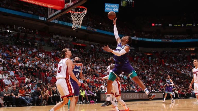 PJ Washington of the Charlotte Hornets shoots the ball against the Miami Heat