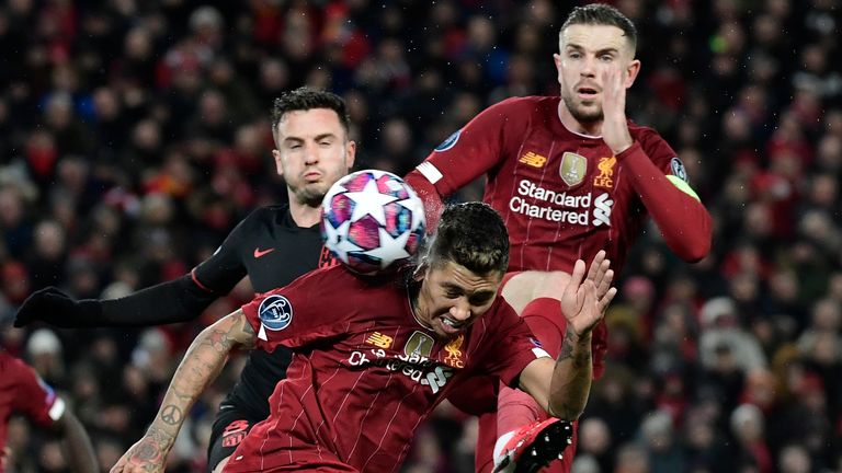 Roberto Firmino tries to get a header on target