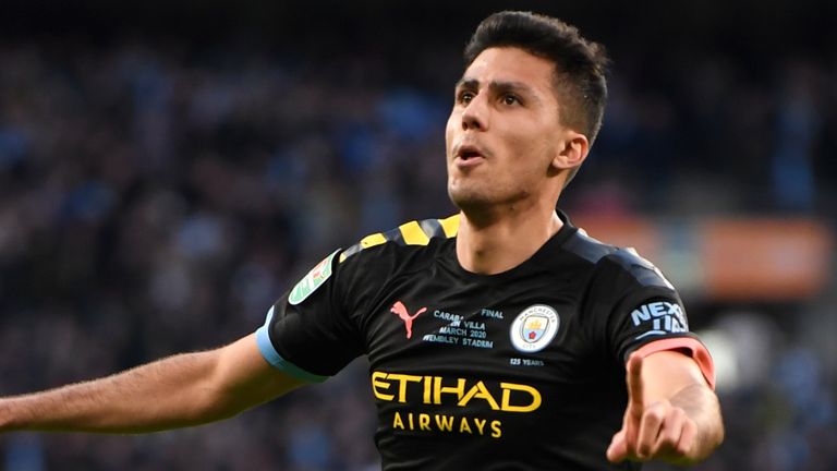 Rodri celebrates Manchester City's second in the Carabao Cup Final.
