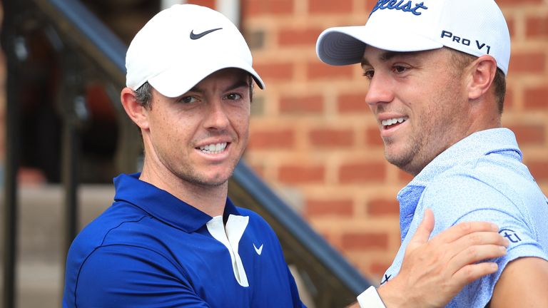 Rory McIlroy of Northern Ireland (lleft) and Justin Thomas of the USA are pictured together during practice for the BMW Championship at Medinah Country Club on August 13, 2019 in Medinah, Illinois. 