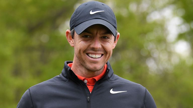 Rory McIlroy (L) of Northern Ireland shares a laugh with his dad Gerry McIlory (R) during a practice round prior to the 2019 PGA Championship at the Bethpage Black course on May 14, 2019 in Bethpage, New York.