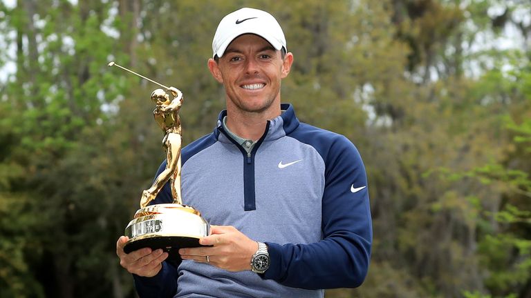 Rory McIlroy displays the trophy following his victory in the 2019 Players Championship