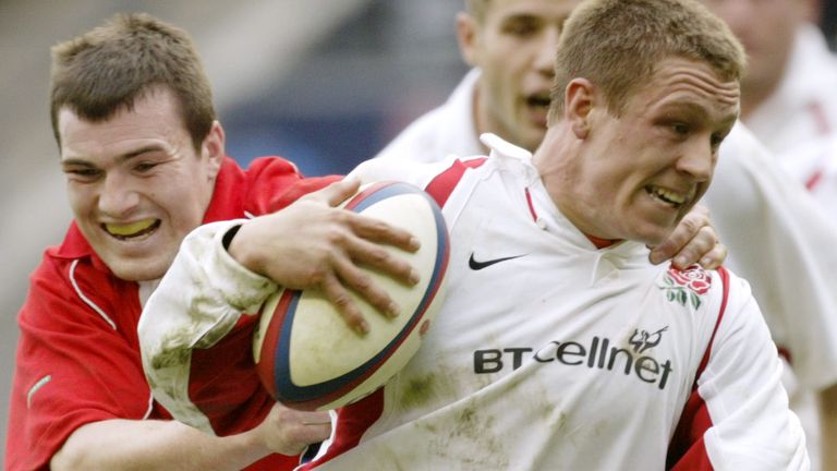 Jonny Wilkinson is tackled by Wales' Iestyn Harris during the 2002 Six Nations