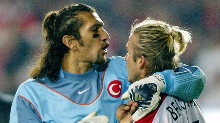 Rustu in action against England in 2003, alongside David Beckham