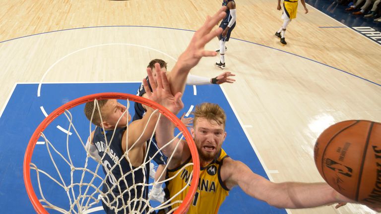 Domantas Sabonis of the Indiana Pacers drives to the basket against the Dallas Mavericks