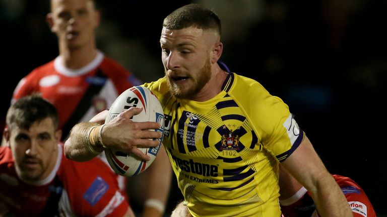 Wigan Warriors Jackson Hastings breaks through to score a  try during the Super League match at the AJ Bell Stadium, Salford.