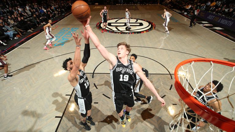 Luka Samanic of the San Antonio Spurs reaches for the ball during the game against the Brooklyn Nets