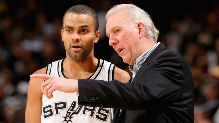 Tony Parker gets instructions from Spurs coach Gregg Popovich