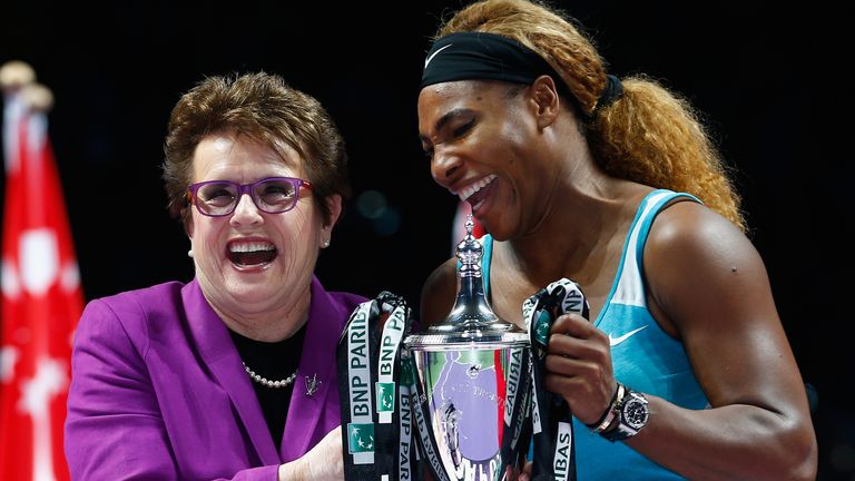 Serena Williams of USA shares a joke with Billie Jean King after her win over Simona Halep of Romania in the final during day seven of the BNP Paribas WTA Finals tennis at the Singapore Sports Hub on October 26, 2014 in Singapore