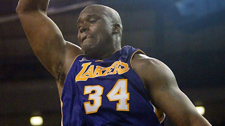 Shaquille O&#39;Neal powers home a dunk for the Lakers