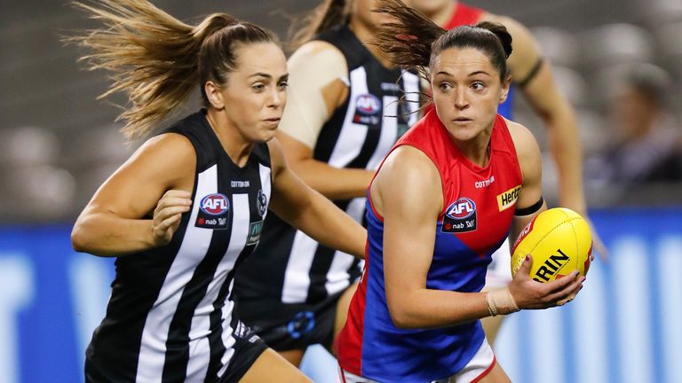 Goldrick in action for the Demons against Collingwood Magpies