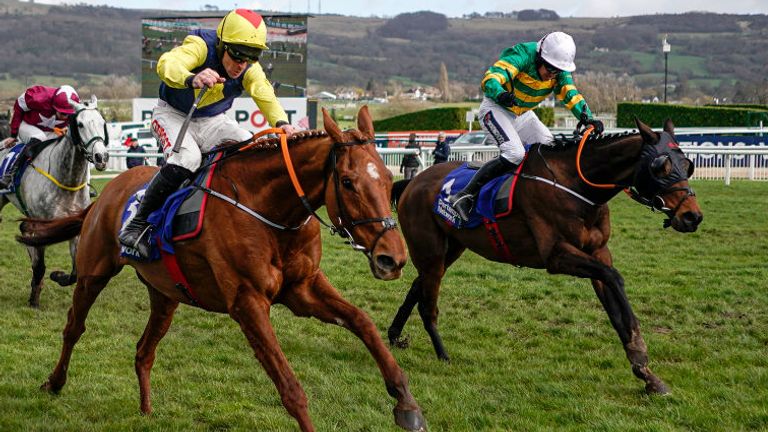 Sire Du Berlais (R) battles with The Storyteller before winning the Pertemps