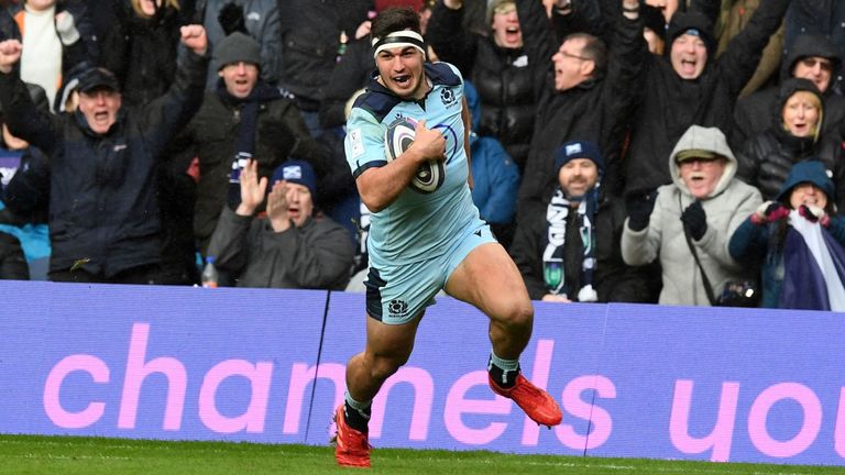 Scotland's Stuart McInally runs in a try during the Six Nations international rugby union match between Scotland and France at Murrayfield Stadium in Edinburgh on March 8, 2020. (Photo by ANDY BUCHANAN / AFP) (Photo by ANDY BUCHANAN/AFP via Getty Images)