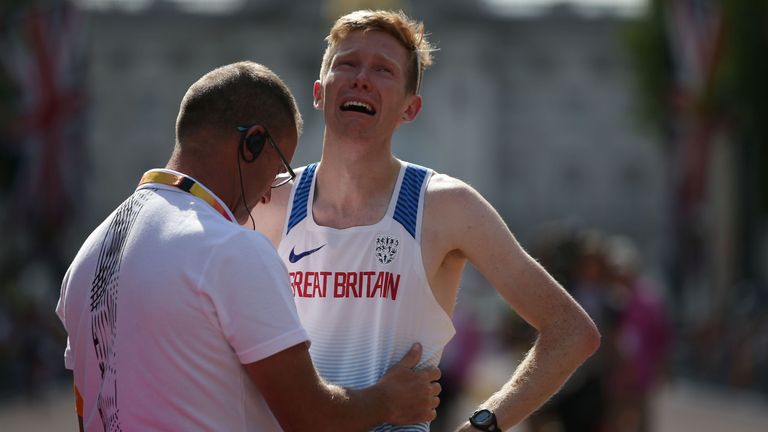 Britain's Tom Bosworth reacts after being disqualified in the men's 20km race walk athletics event at the 2017 IAAF World Championships on The Mall in central London on August 13, 2017. / AFP PHOTO / Daniel LEAL-OLIVAS (Photo credit should read DANIEL LEAL-OLIVAS/AFP via Getty Images)