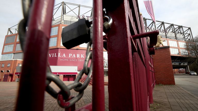 A view of locked gates at Villa Park in Birmingham. All Premier League football has been suspended in response to the Coronavirus pandemic