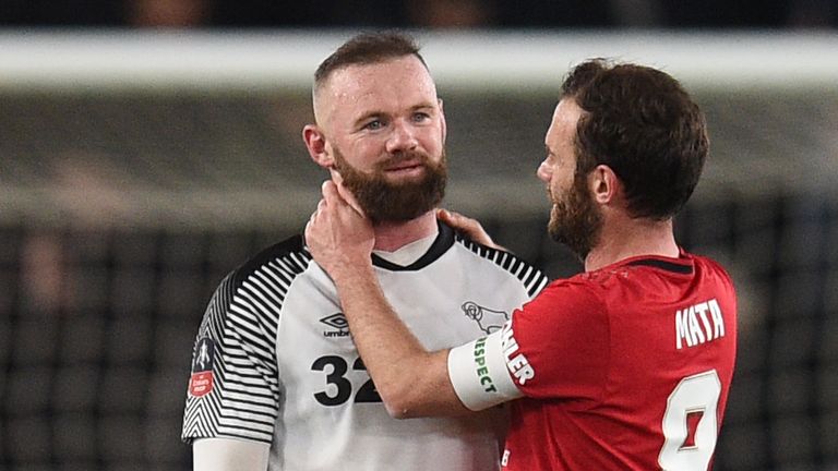 Juan Mata consoles Wayne Rooney after Manchester United&#39;s win over Derby County in the FA Cup