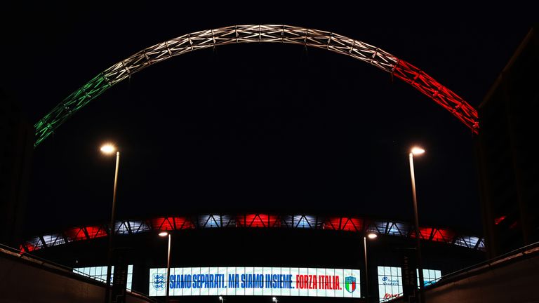 The Wembley arch is lit up in the colours of the Italian flag in a show of solidarity amid the coronavirus pandemic