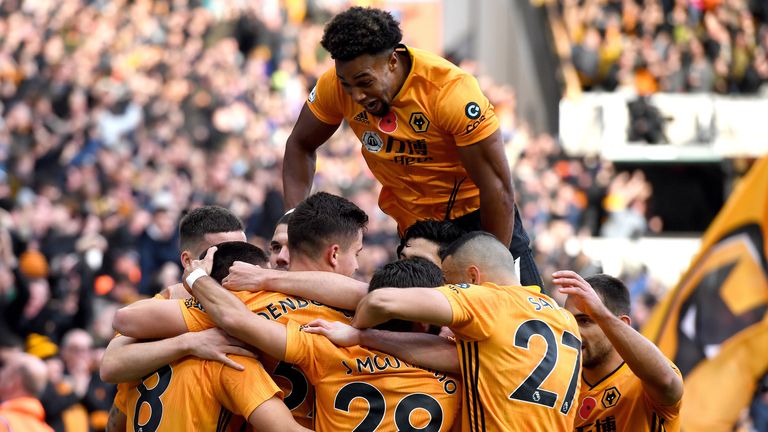 Wolves celebrate after scoring against Aston Villa at Molineux in November 2019